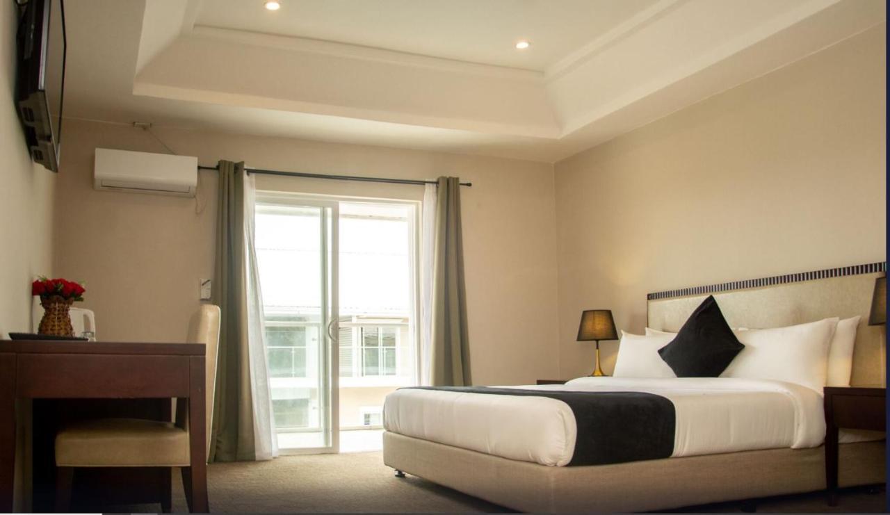 Royal Ambassador Hotel Harbel Extérieur photo