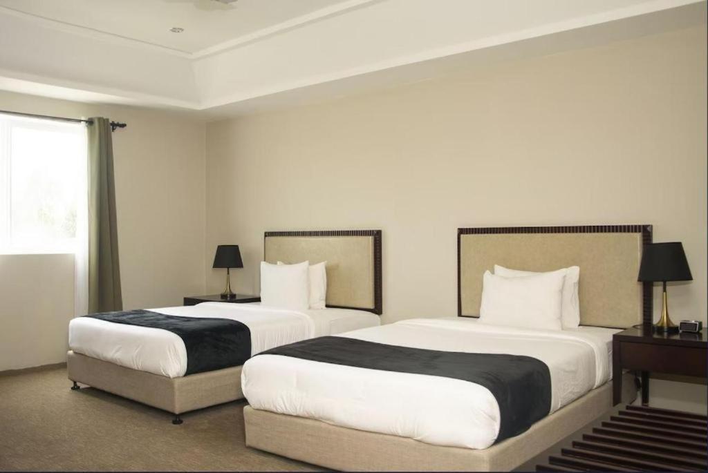 Royal Ambassador Hotel Harbel Extérieur photo