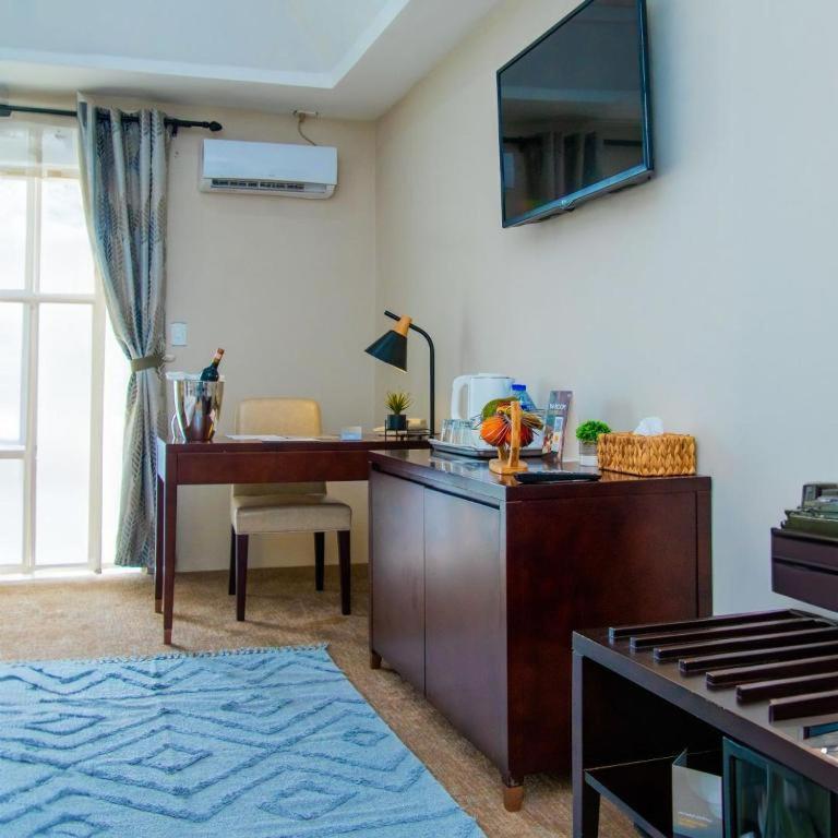 Royal Ambassador Hotel Harbel Extérieur photo